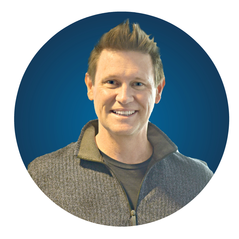 Round portrait of eRank CEO, Anthony Wolf - white male in a gray sweater smiling